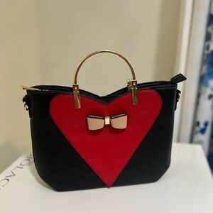 Black and red hearted handbag